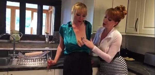  Mature redhead fucks her girlfriend with a rolling pin